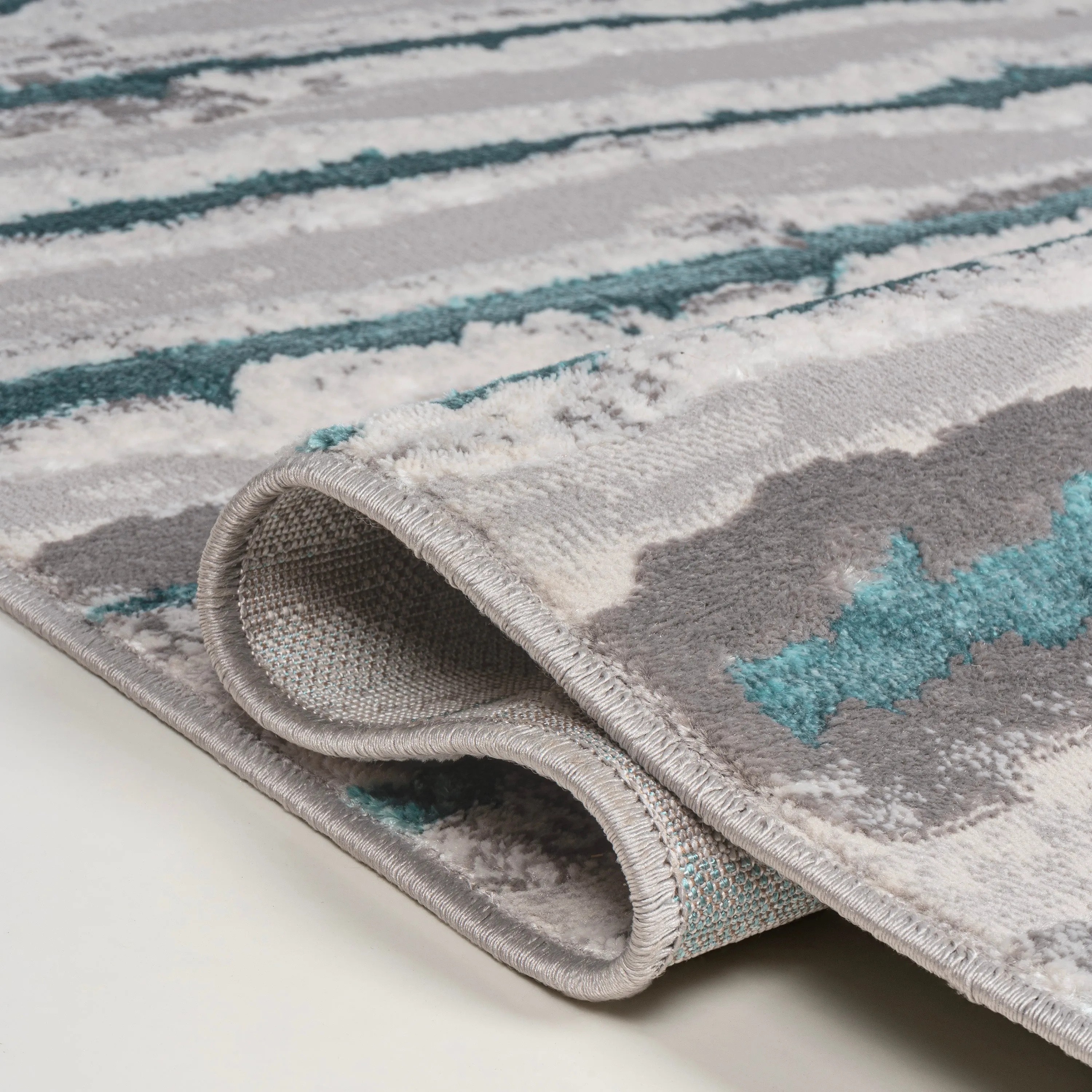 Chogolisa Batten Modern Stripe Area Rug